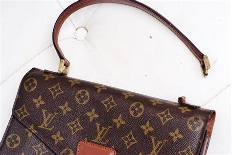 louis vuitton purse repair parts.